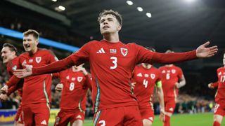 Neco Williams celebrates after scoring a goal for Wales at the Euro 2024 playoffs