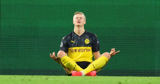 Erling Haaland of Borussia Dortmund celebrates after scoring his team's first goal during the UEFA Champions League round of 16 first leg match between Borussia Dortmund and Paris Saint-Germain at Signal Iduna Park on February 18, 2020 in Dortmund, Germany.