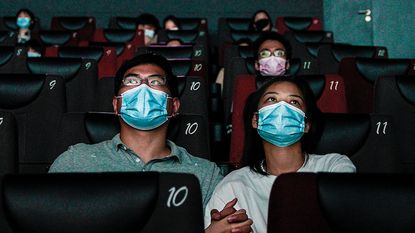 Masked cinema-goers