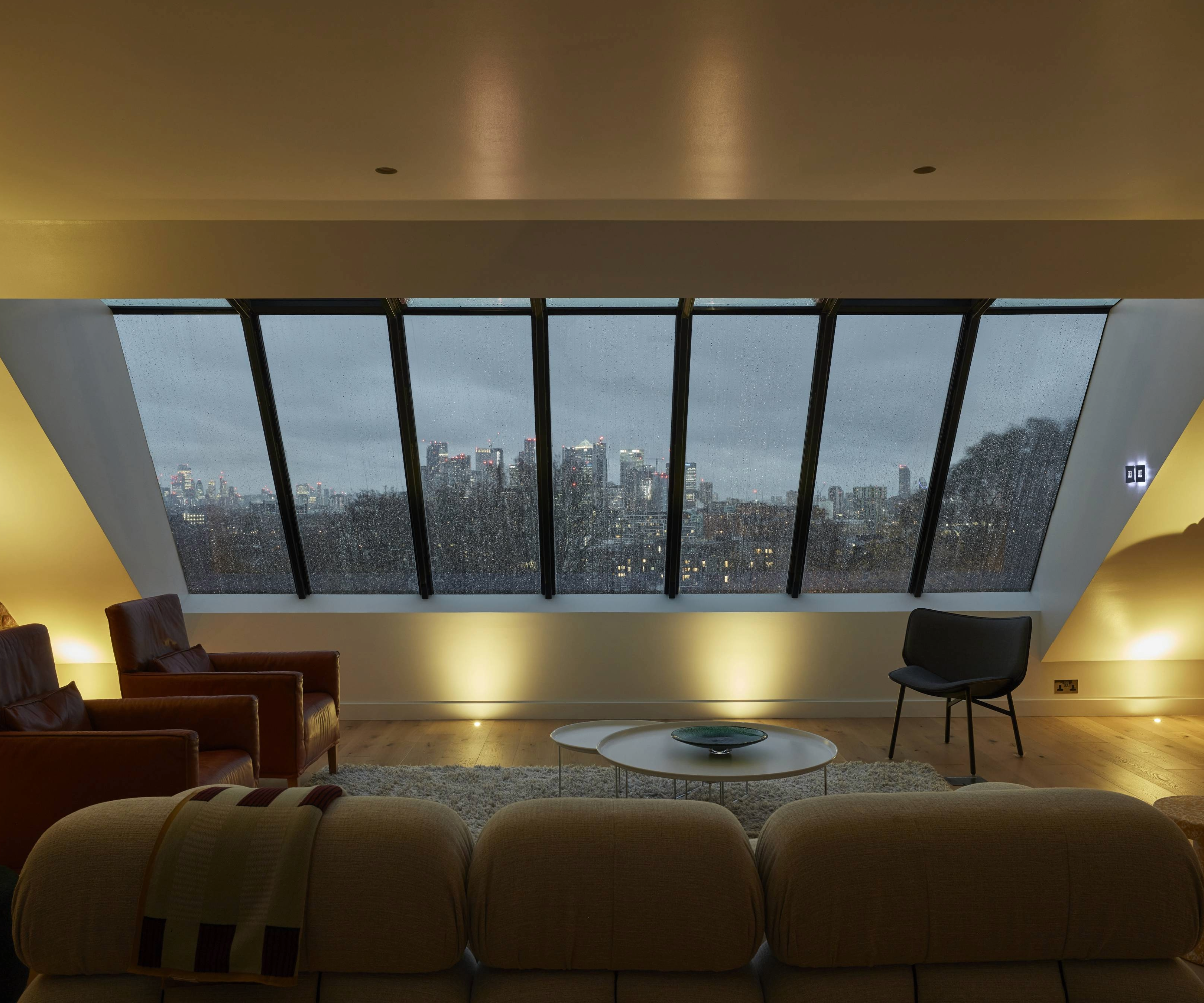 Loft with views overlooking high rise London buildings