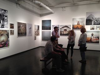 Visitors in 'The Afronauts' Gallery Exhibit