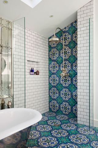 Drummonds Dalby shower with green and blue patterned tiles.