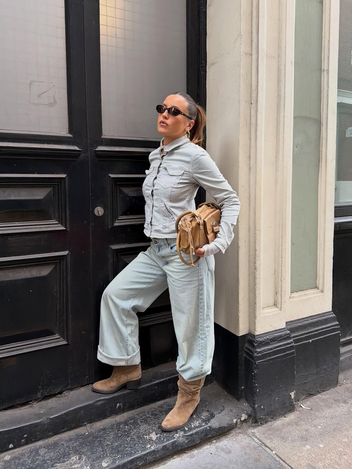 An image of @oliviagraceherring wearing double denim.