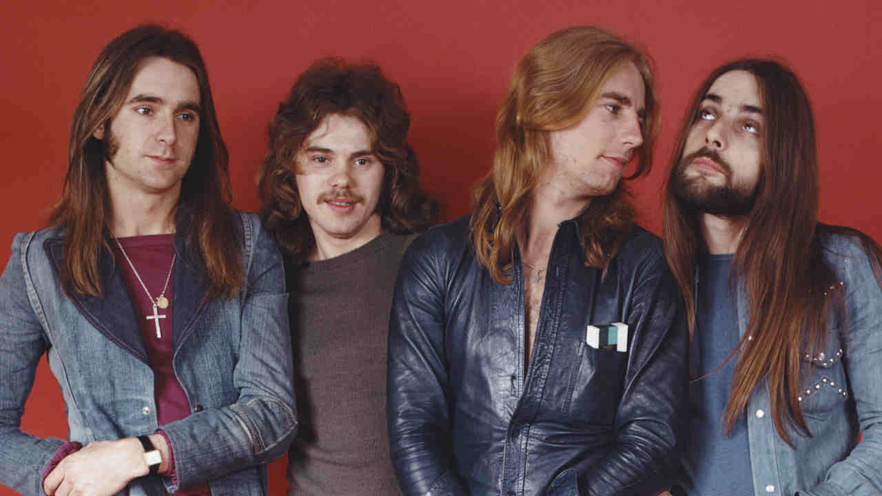 Status Quo posing for a photograph in the 1970s