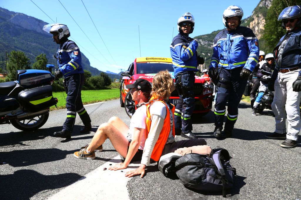 MEGEVE FRANCE JULY 12 Protesters in defending Mont Blanc environment block the route during the 109th Tour de France 2022 Stage 10 a 1481km stage from Morzine to Megve 1435m TDF2022 WorldTour on July 12 2022 in Megeve France Photo by Michael SteeleGetty Images