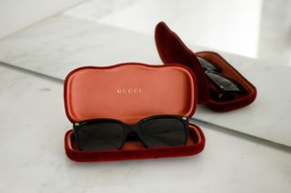 Gucci Sunglasses in a red case