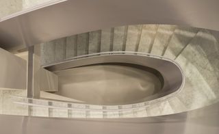 Marble curved staircase Roberto Baciocchi has also designed boutique stores for both Prada and Miu Miu