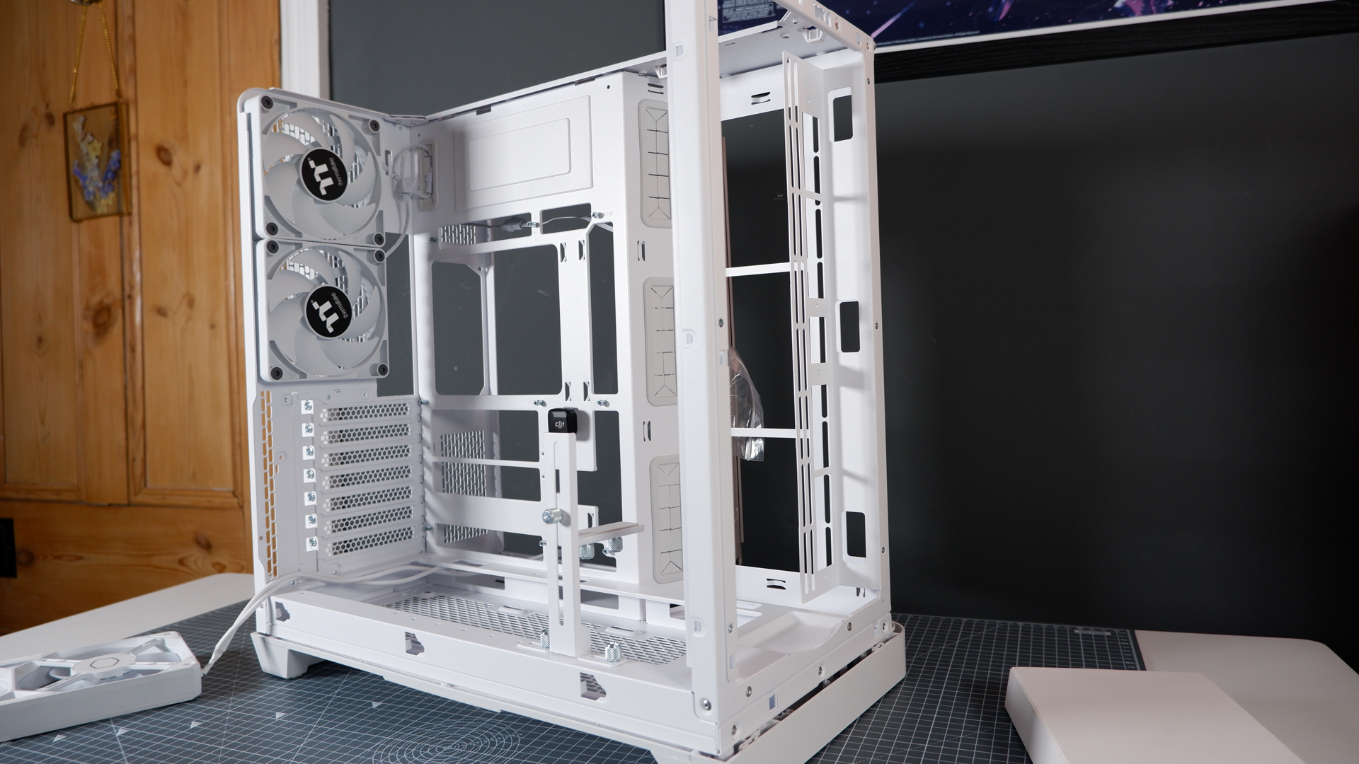 Thermaltake View 390 Air chassis on a desk. We're building a PC into it for testing and comparison with other PC cases.