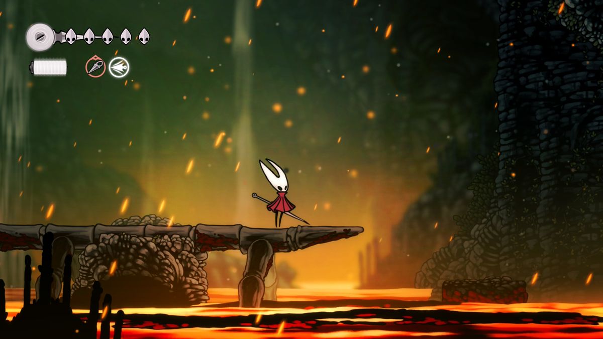 Hornet stands on bone above lava in Hollow Knight: Silksong