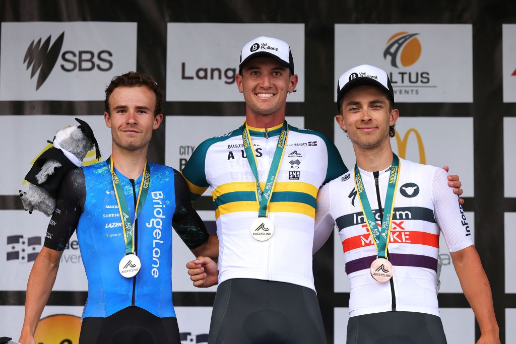 BALLARAT AUSTRALIA JANUARY 15 LR Mathew Dinham of Australia on second place race winner Blake Quick of Australia and Tristan Saunders of Australia on third place pose on the podium ceremony after the Australian Cycling National Championships 2022 Mens U23 Road Race a 1392km race from Ballarat to Ballarat AusCyclingAus on January 15 2022 in Ballarat Australia Photo by Con ChronisGetty Images