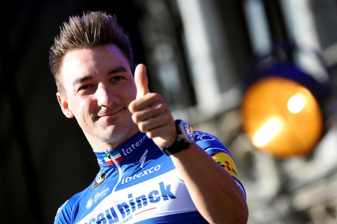Elia Viviani gives thumbs up on stage at the Tour de France presentation in Brussels