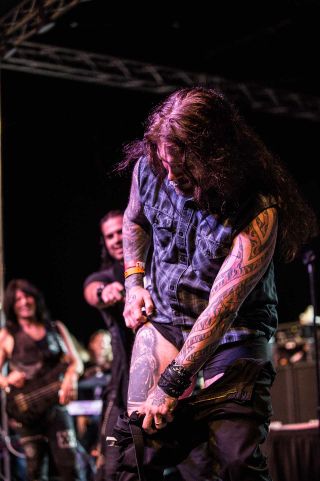 Machine Head's Phil Demmel shows off his Randy Rhoads tattoo