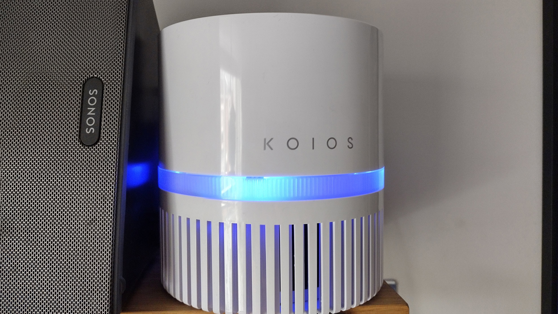 Image shows the KOIOS EPI810 air purifier resting on a shelf.