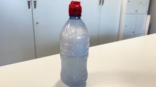 Plastic bottle with suds for hard water test