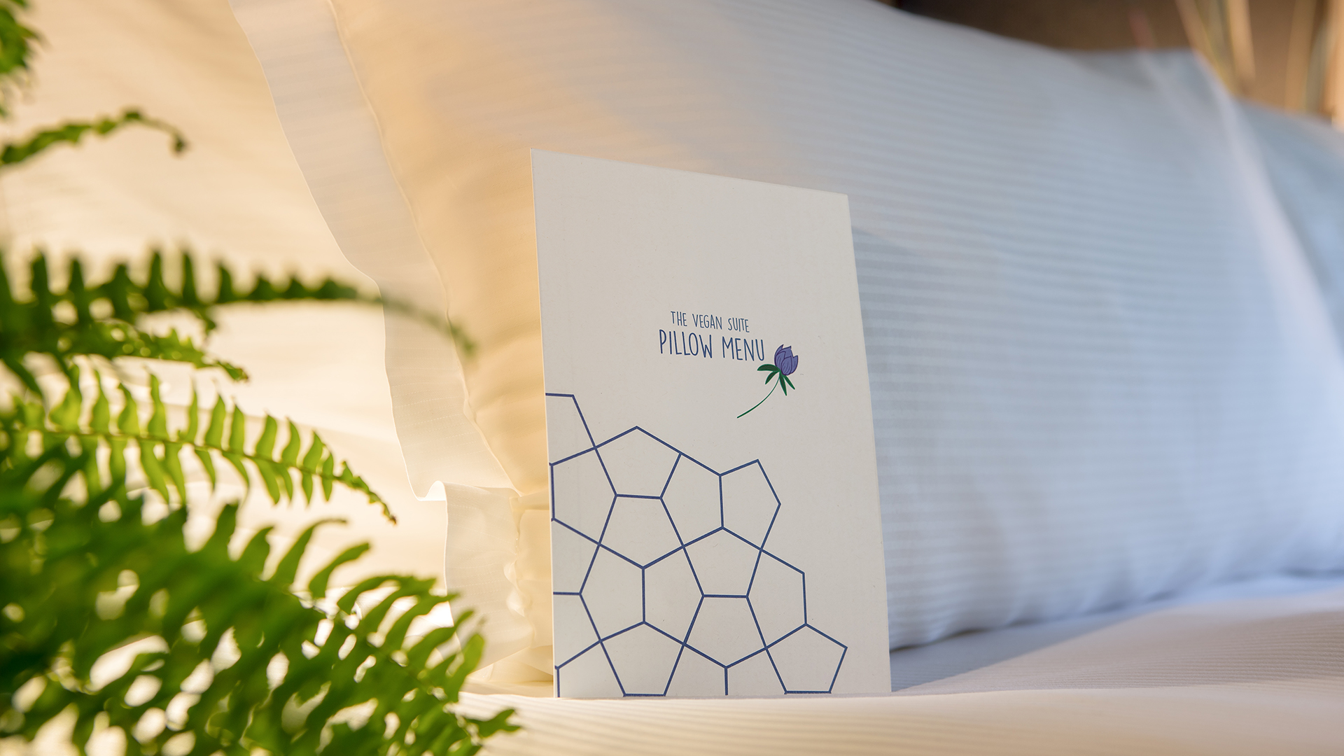 The pillow menu resting on a bed at the Hilton London Bankside hotel and sleeping retreat