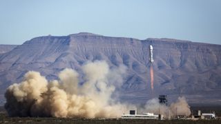 The reusable New Shepard space vehicle ascends through clear skies to an apogee of 339,138 feet (103,369 meters).