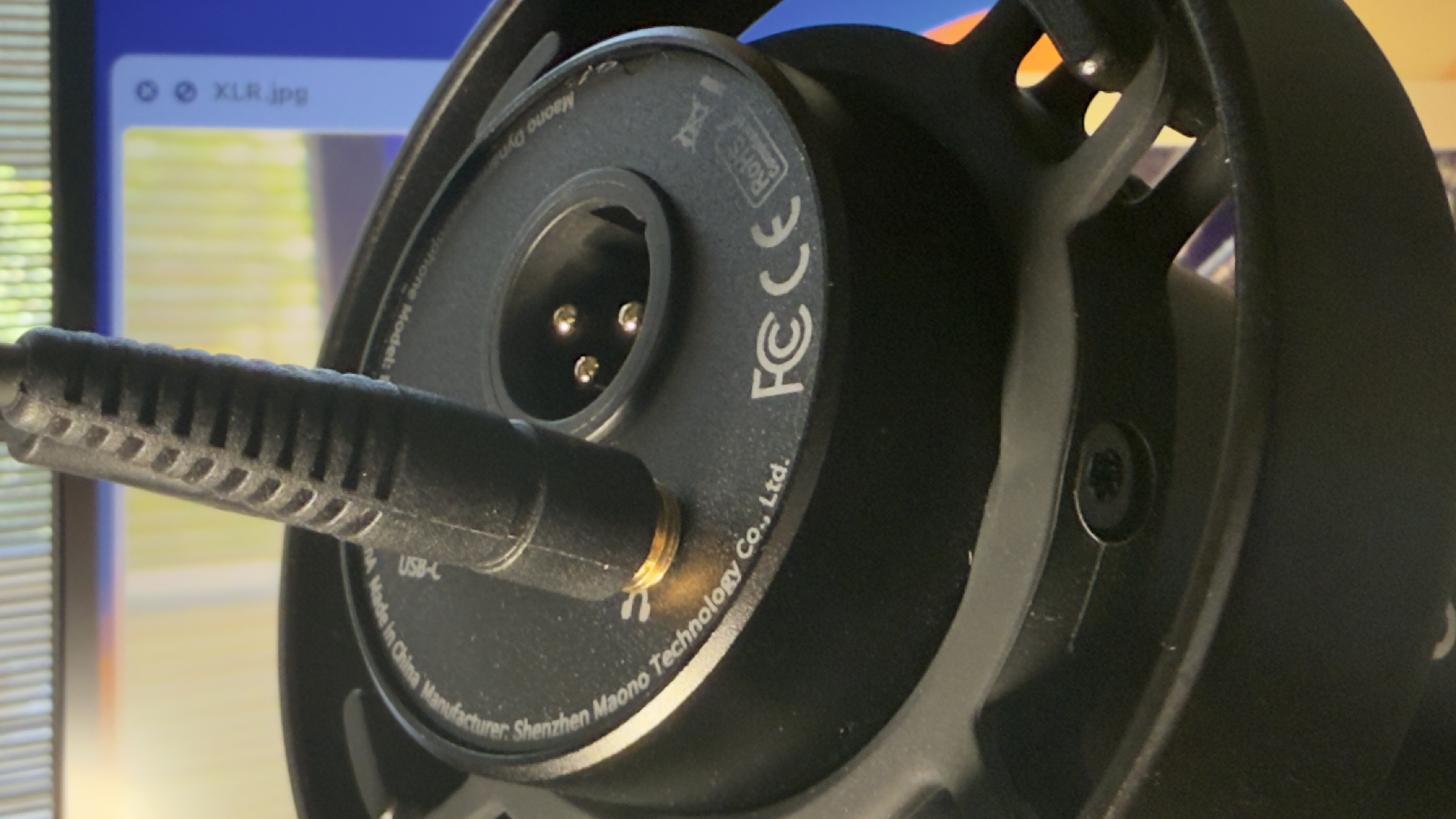 Close-up of the rear of the mic to display the 3-pin male XLR socket