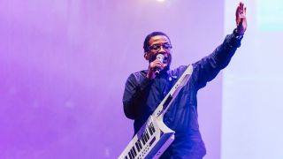 Herbie Hancock live onstage with a keytar in 2022