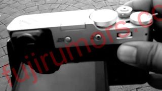 Original leaked image, showing the D-pad-free rear of the Fujifilm X100V