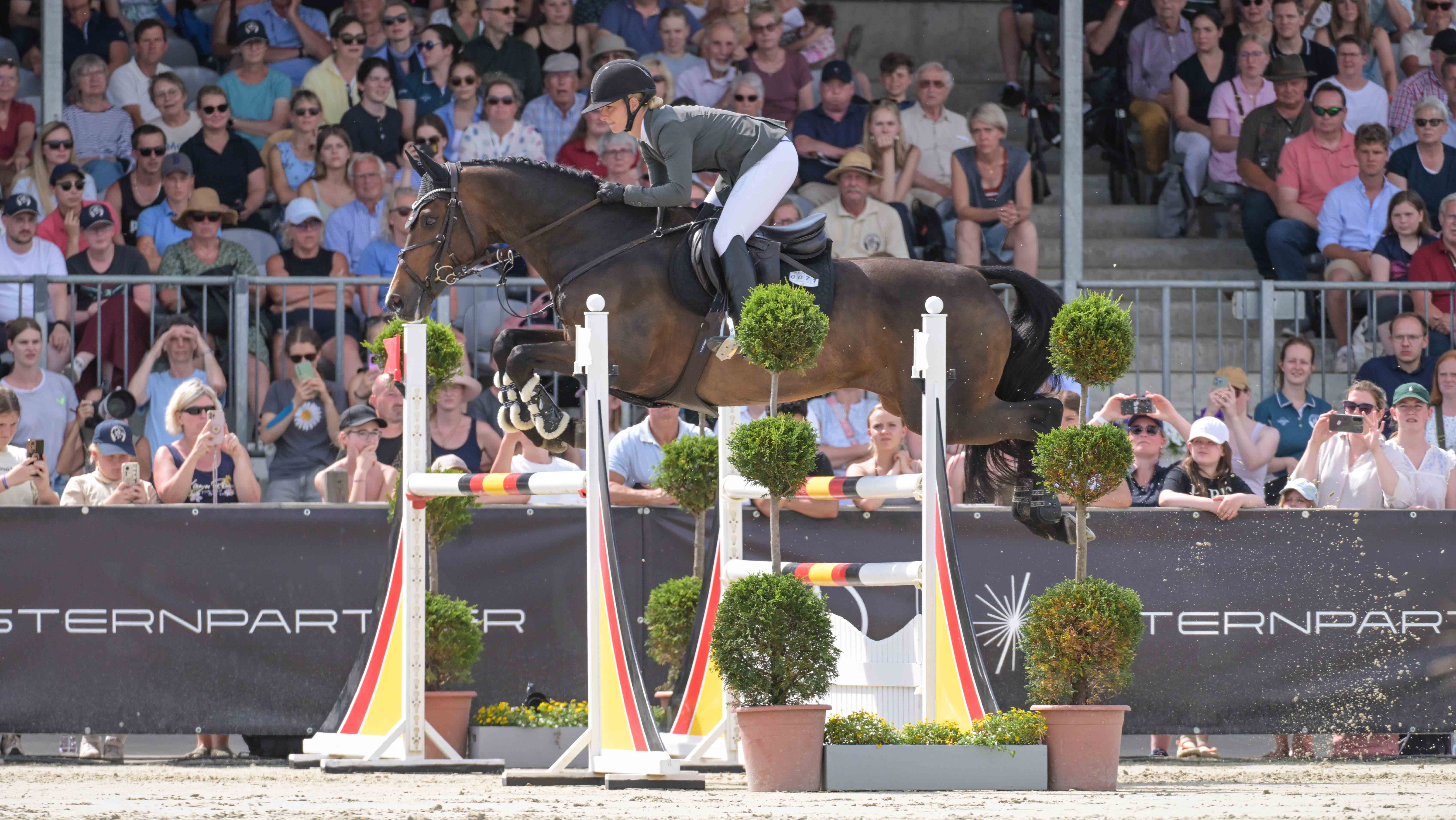 Germany's Julia Krajewski and Uelzener's Nickel topped the Luhm&uuml;hlen Horse Trials CCI4*-S results. Here they are pictured in the showjumping phase.