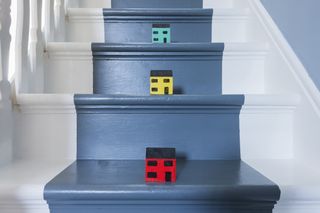 Three tiny houses on a staircase