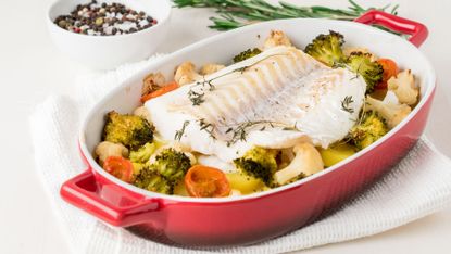 Baked white fish and vegetables