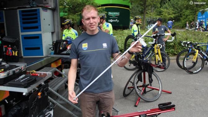 Kristensen shows off a common tool for measuring from the bottom bracket