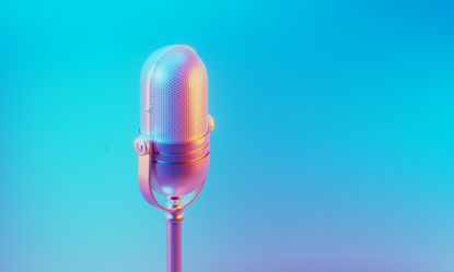 Microphone illuminated by blue and pink lights on blue and pink background
