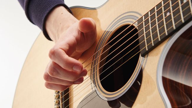 playing guitar with cut fingers playing guitar with cut fingers