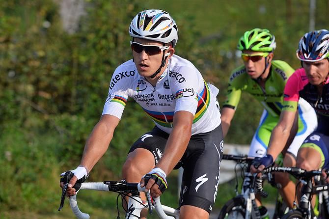 World champion Michal Kwiatkowski (Omega Pharma-QuickStep) suffers from a leg cramp during the race