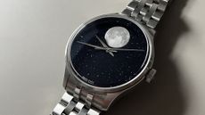 The Christopher Ward C1 MoonPhase on a grey background