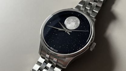 The Christopher Ward C1 MoonPhase on a grey background