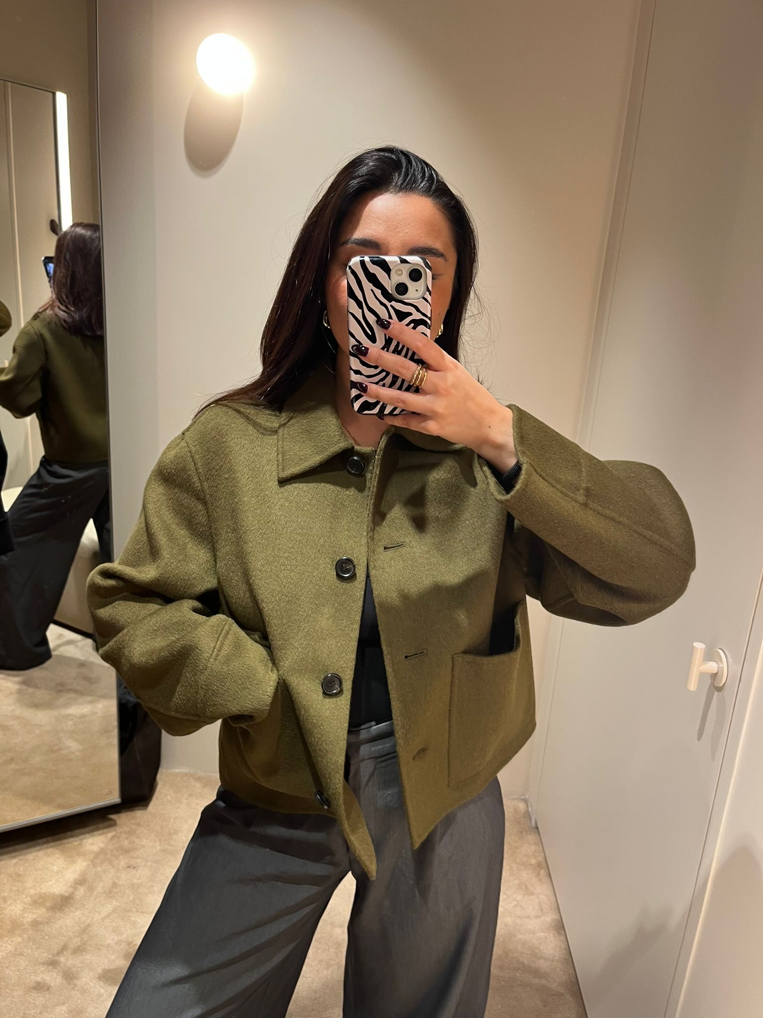 Senior Shopping Editor Marina wearing green COS Wool Jacket