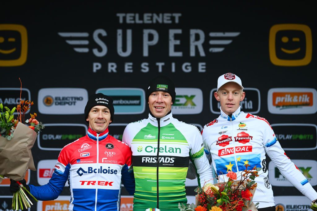 RIJKEVORSEL BELGIUM NOVEMBER 19 LR Lars Van Der Haar of The Netherlands and Team Baloise Trek Lions on second place race winner Laurens Sweeck of Belgium and Team CrelanFristads and Michael Vanthourenhout of Belgium and Team Pauwels Sauzen Bingoal on third place pose on the podium ceremony after the 36th Superprestige Merksplas 2022 Mens Elite Superprestige2023 CXWorldCup CycloCross on November 19 2022 in Rijkevorsel Belgium Photo by Luc ClaessenGetty Images