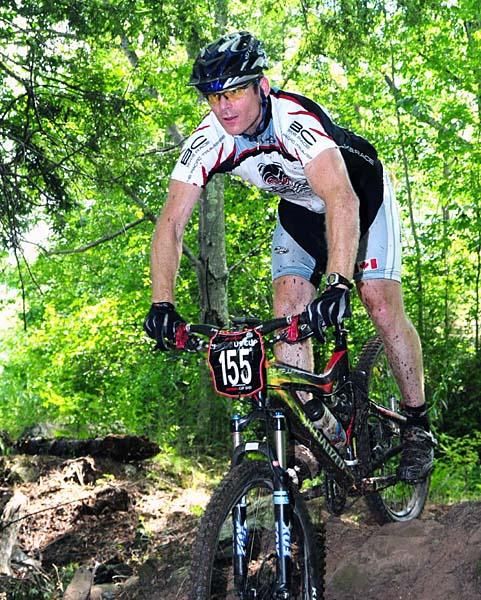 Clark Tanner rides to second place in the 40-44 group.
