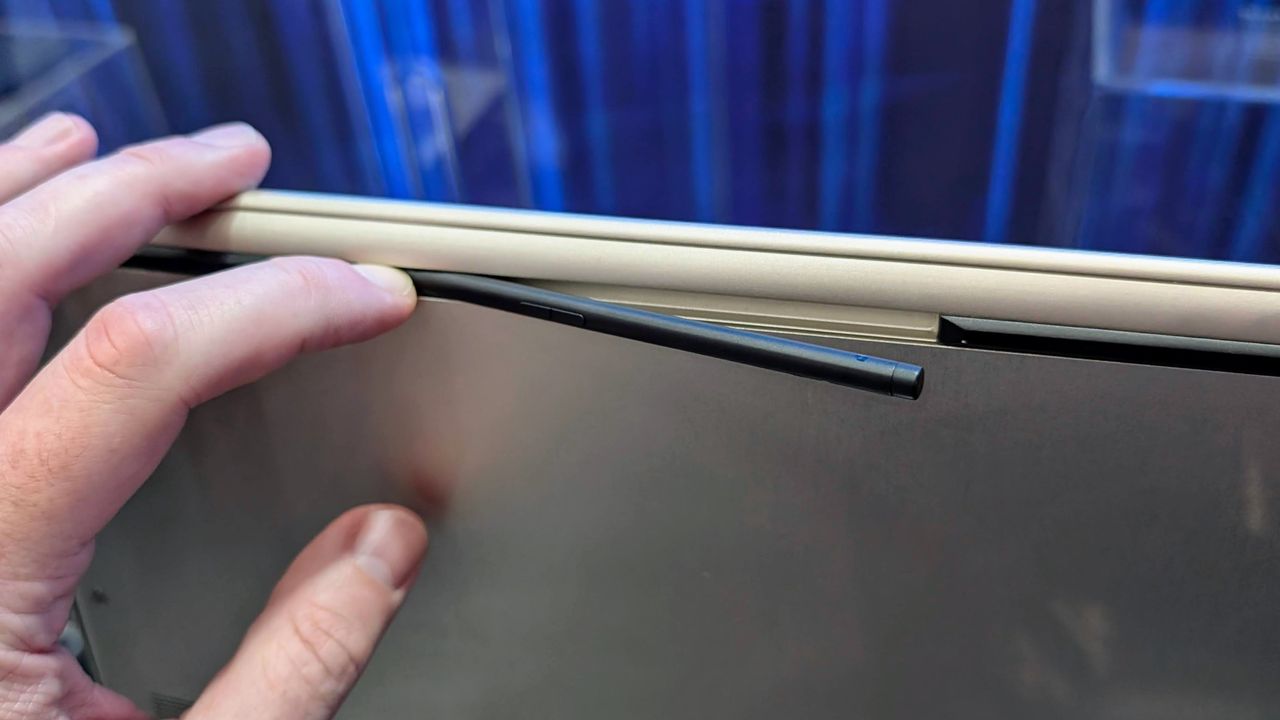 Unnamed MSI Panther Lake business laptop showing hidden stylus on the underside at Computex 2025