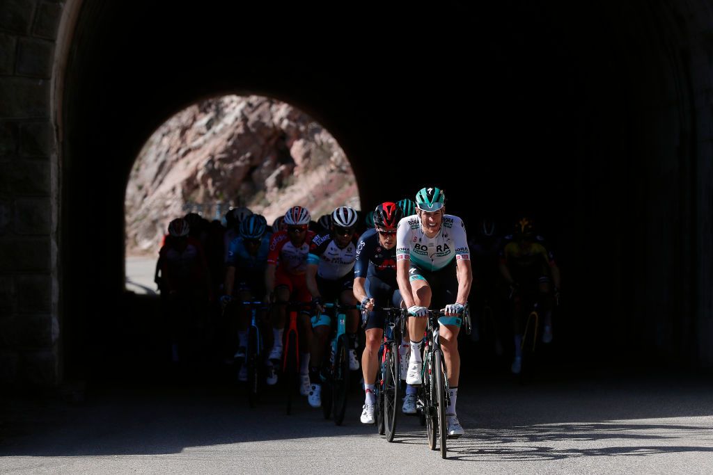 VALDEBLORE LA COLMIANE FRANCE MARCH 13 Nils Politt of Germany and Team Bora Hansgrohe Rohan Dennis of Australia and Team INEOS Grenadiers during the 79th Paris Nice 2021 Stage 7 a 119km stage from Le Broc to Valdeblore La Colmiane 1501m Peloton Tunnel Stage itinerary redesigned due to COVID19 lockdown imposed in the city of Nice ParisNice on March 13 2021 in Valdeblore La Colmiane France Photo by Bas CzerwinskiGetty Images