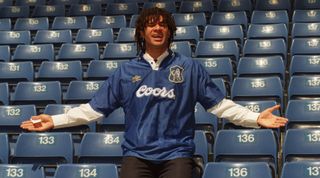 Ruud Gullit poses after signing for Chelsea, June 1995
