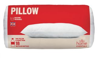 white pillow in white and red packet