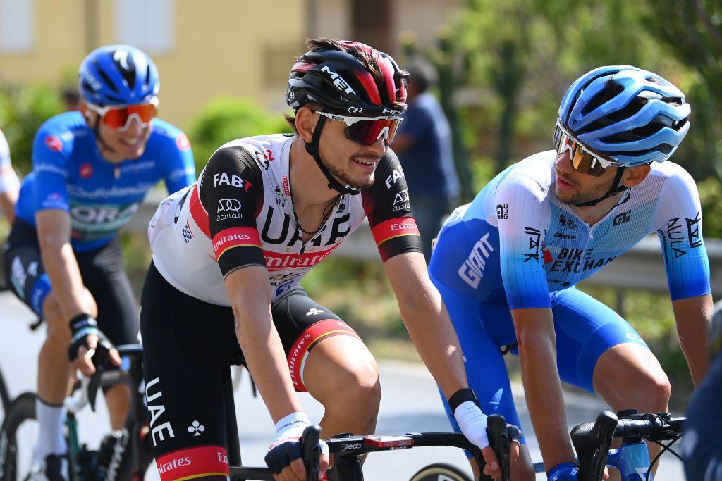 SCALEA ITALY MAY 12 LR Alessandro Covi of Italy and UAE Team Emirates and Matteo Sobrero of Italy and Team BikeExchange Jayco compete during the 105th Giro dItalia 2022 Stage 6 a 192km stage from Palmi to Scalea Giro WorldTour on May 12 2022 in Scalea Italy Photo by Tim de WaeleGetty Images