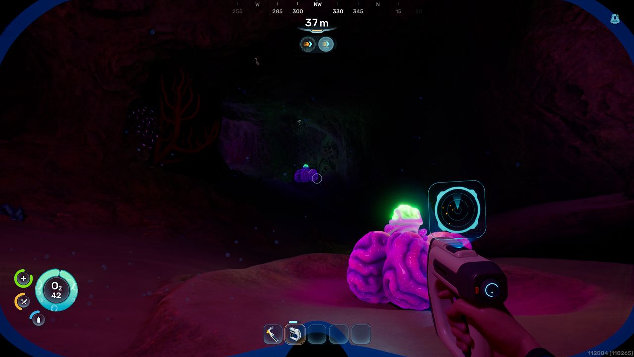 Forza Horizon 6 Acidic Raion Pouch: A player looking at an Acidic Raion inside a dark cave, with another one in the distance.