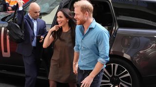 Meghan Markle and Prince Harry step out of a range rover to attend an event in Melbourne 2026. 