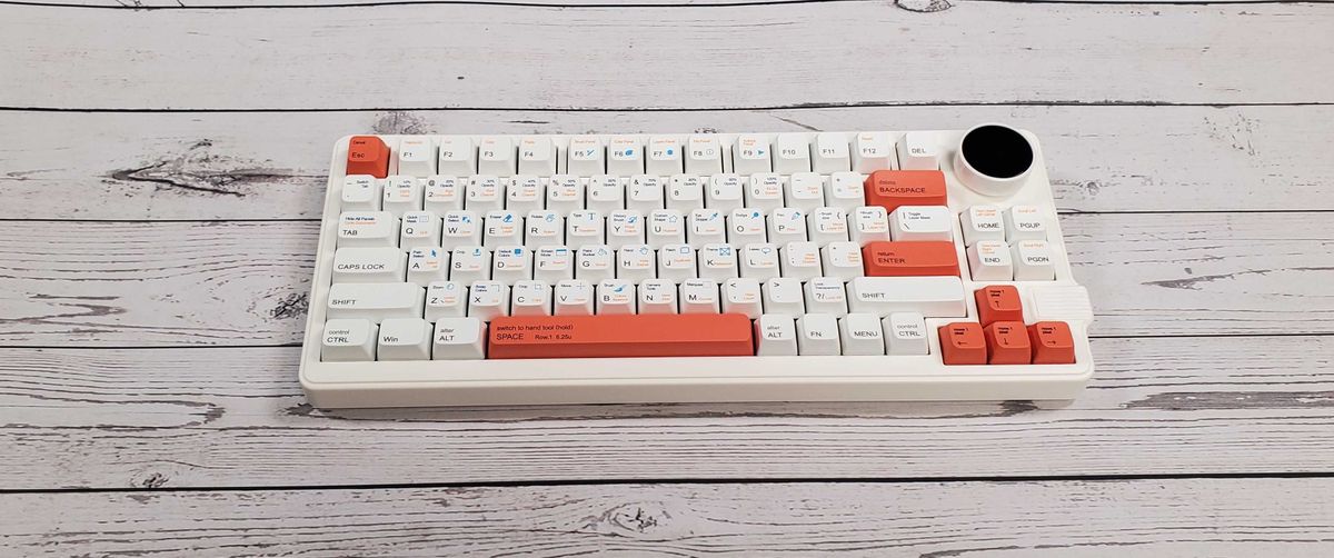 The Gamakay LK75 75%, a white and orange mechanical keyboard