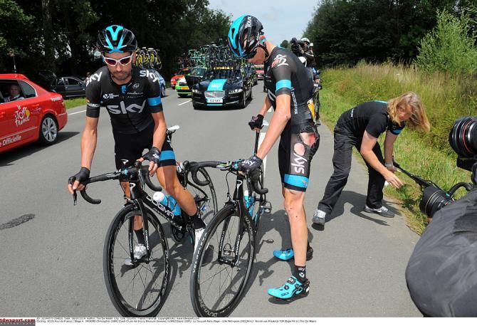 Froome gets support from his Team Sky teammate David Lopez after the stage 4 crash