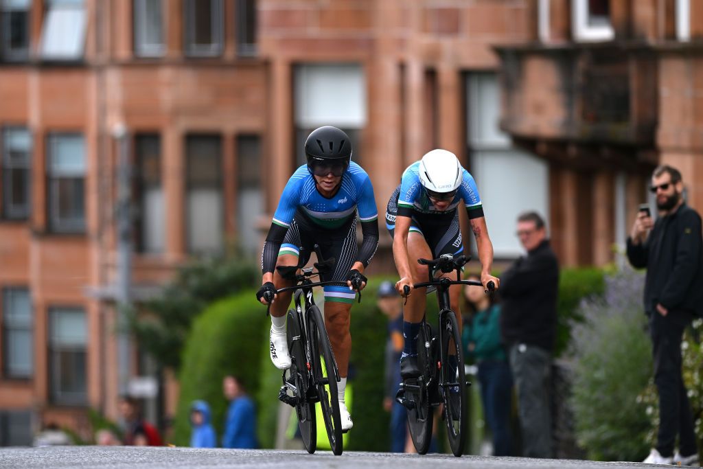 GLASGOW SCOTLAND AUGUST 08 Sofiya Karimova Yanina Kuskova Olga Zabelinskaya and Team Uzbekistan sprint during the Team Time Trial Mixed Relay a 403km race from Glasgow to Glasgow at the 96th UCI Cycling World Championships Glasgow 2023 Day 6 UCIWT on August 08 2023 in Glasgow Scotland Photo by Dario BelingheriGetty Images