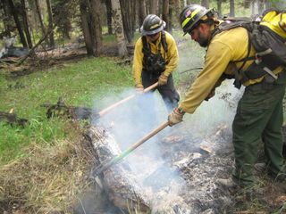 Firefighters working at the Little Sand fire
