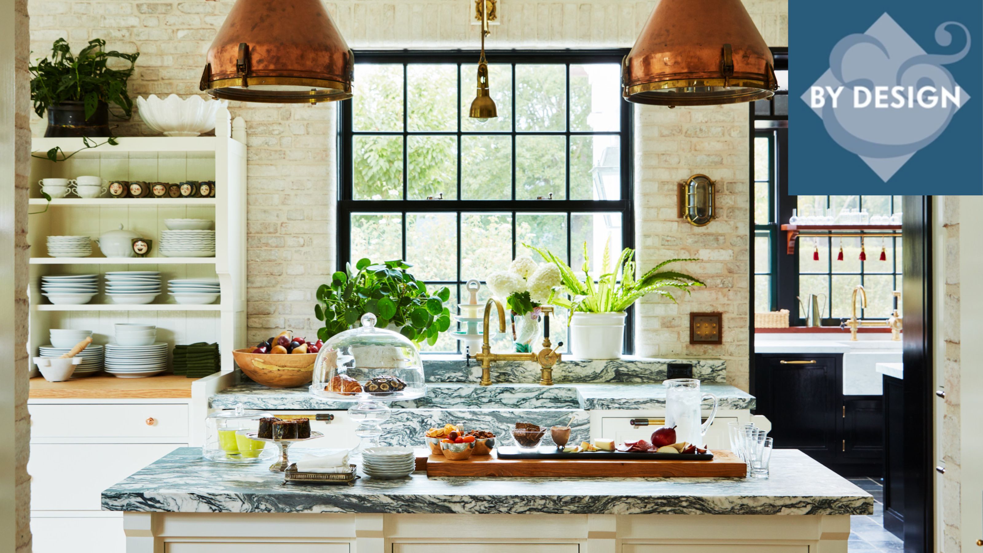Bryan Graybill's kitchen with copper pendant lights over a marble-topped kitchen island