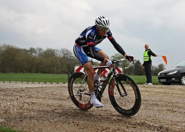 Team Designa K&oslash;kken-Blue Water rider entering the fifth Gravel Road