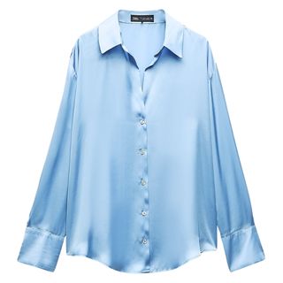 Zara blue satin shirt flatlay on white background