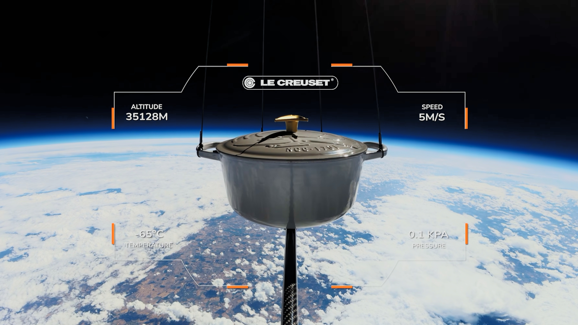 The Le Creuset Star Trek Casserole Dish flying above the Earth.